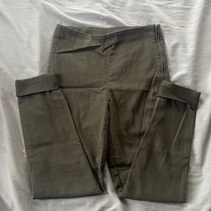 Army green skinny jeans with zipper and button on side
